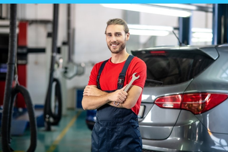 Smiling service tech | Faulkner Automotive Group in Trevose PA
